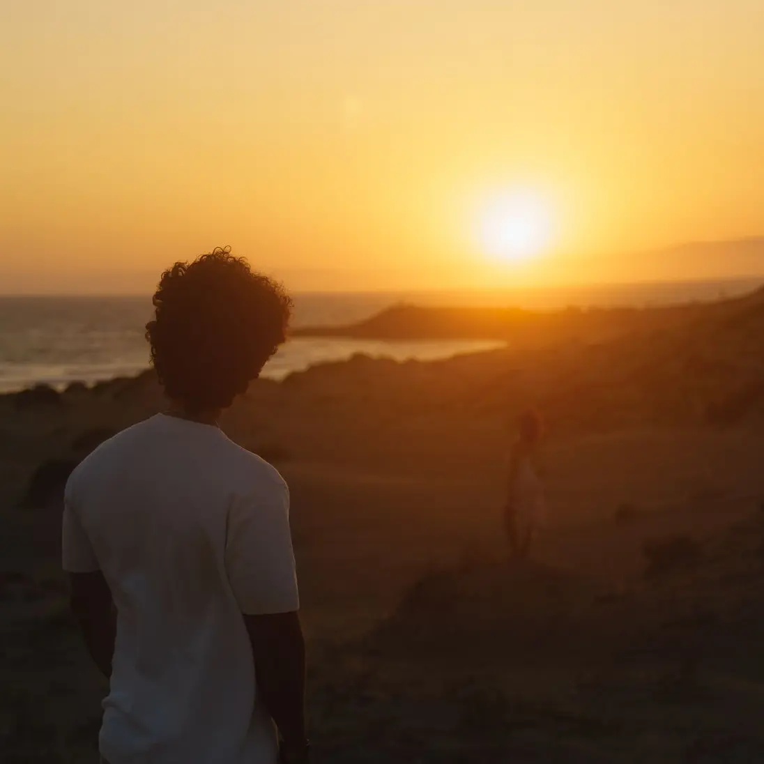 Cinematic and dramatic photography of a couple eloping at sunset